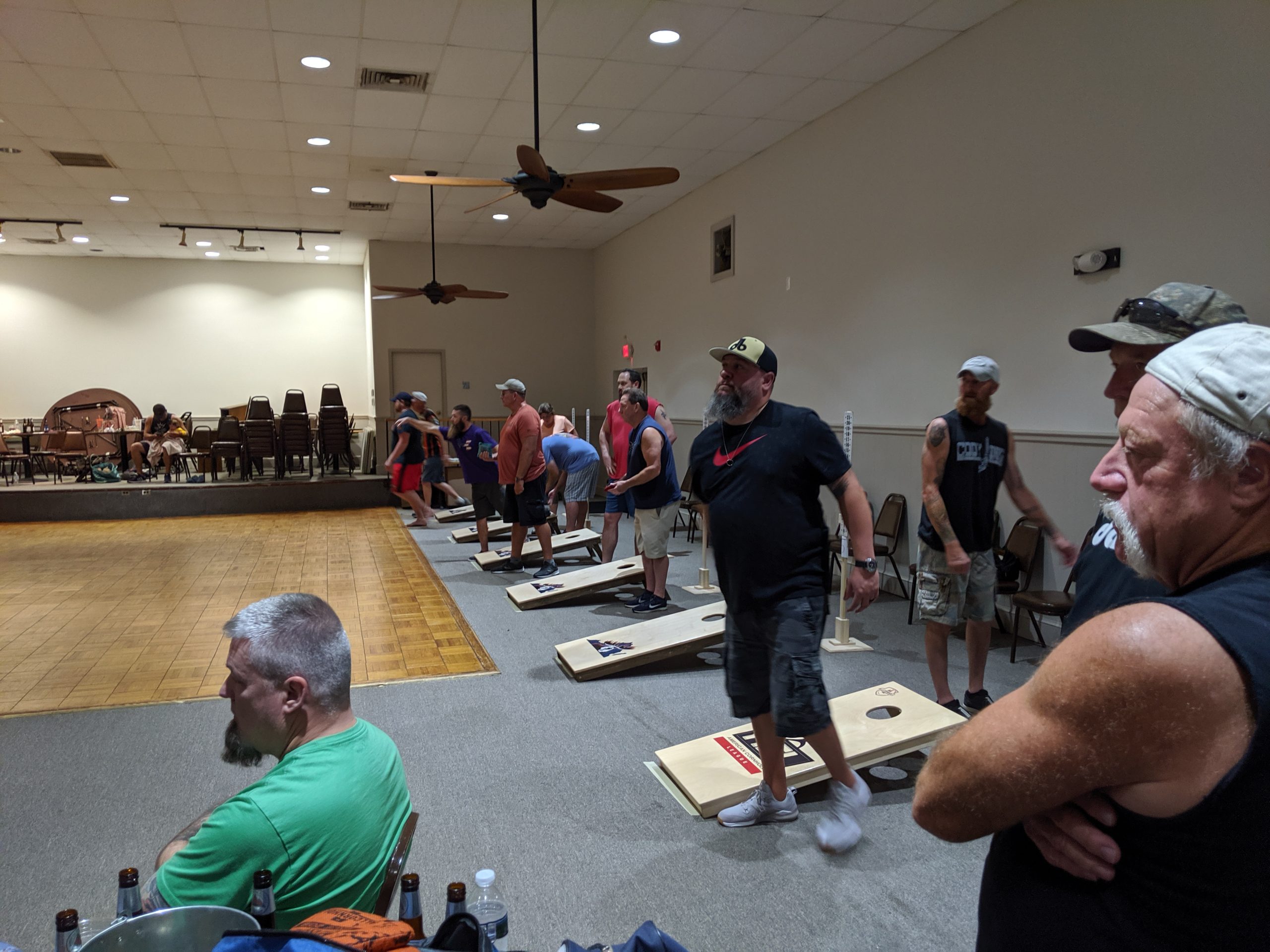 Members playing Cornhole